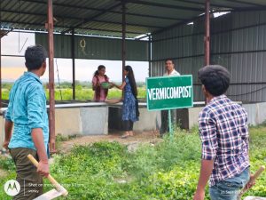 Filling of manure in vermi compost pits by second year diploma students (3)