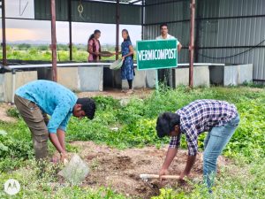 Filling of manure in vermi compost pits by second year diploma students (6)